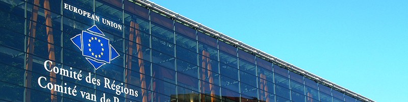 Slider: Foto des Gebäudes und Logos des Komitees der Regionen in Brüssel