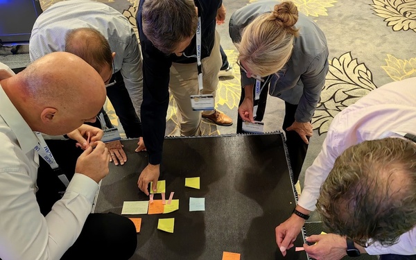 news_image_13.jpeg Speakers solving problems together
