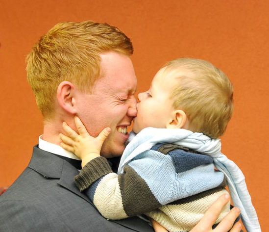 GGL Graduate with son