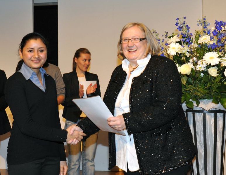 Still handing out certificates...
