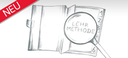 Zierbild: Geöffnetes Buch mit Lupe, die das Wort 'Lehrmethode' vergrößert darstellt - Banner Neu