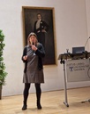 A woman is giving a speech4