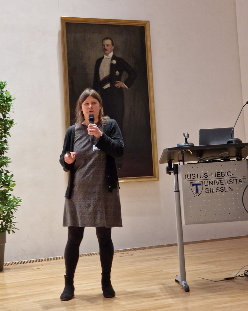 A woman is giving a speech4