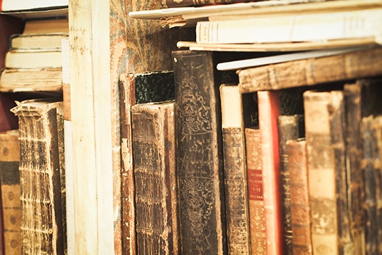 Akzentbereiche Close-up of several old books on a shelf