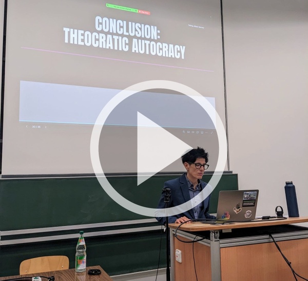 Prof. K. Allison Hammer in lecture hall.JPG