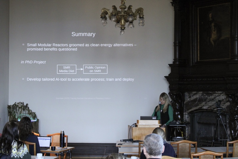Argyro Gavrilaki discusses how SMRs influence public debates and nuclear energy visions in Germany during the Junior Scholar Colloquium © Belsoff.jpg