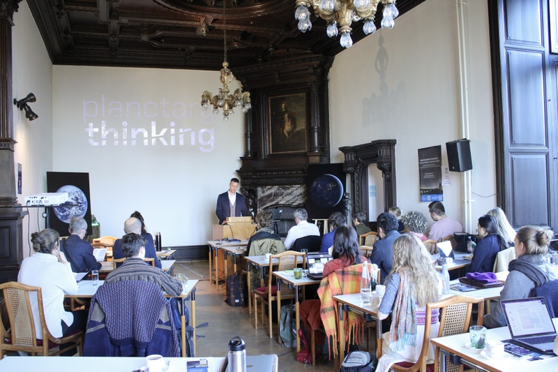 Frederic Hanusch, Co-Founder of the Panel on Planetary Thinking, delivering the welcome address © Belsoff.jpg