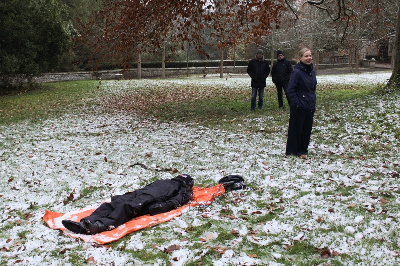 On the castle grounds, Miranda Whall (artist) engages with soil-sensor readings as Milja Kurki (Planetary Agency & Politics Fellow) provides an explanation of the ongoing experiment to participants © Belsoff.jpg